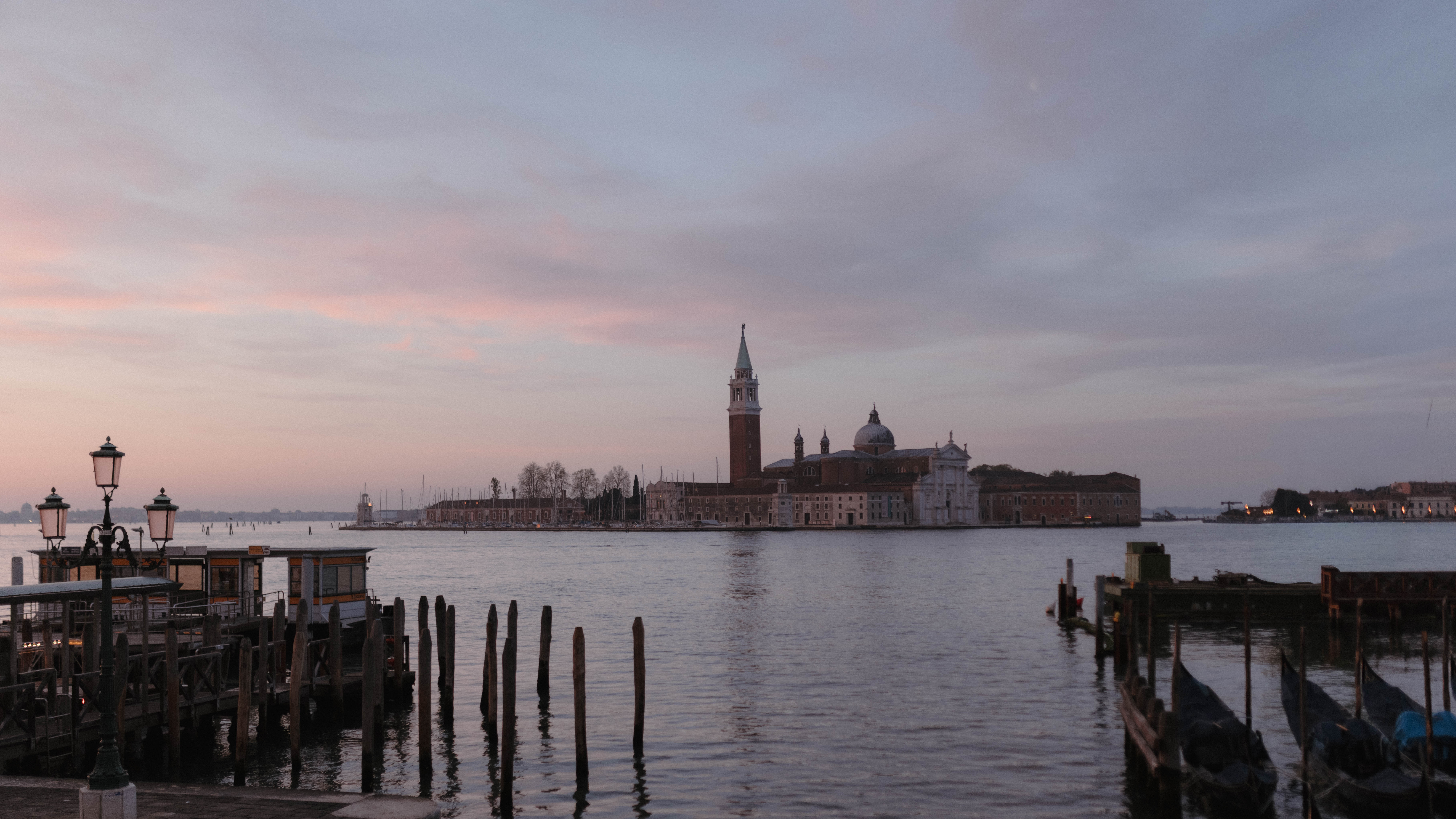 San Giorgio Maggiore at sunset in Venice Italy, cinematic destination wedding and elopement photographer capturing iconic Venice lagoon views