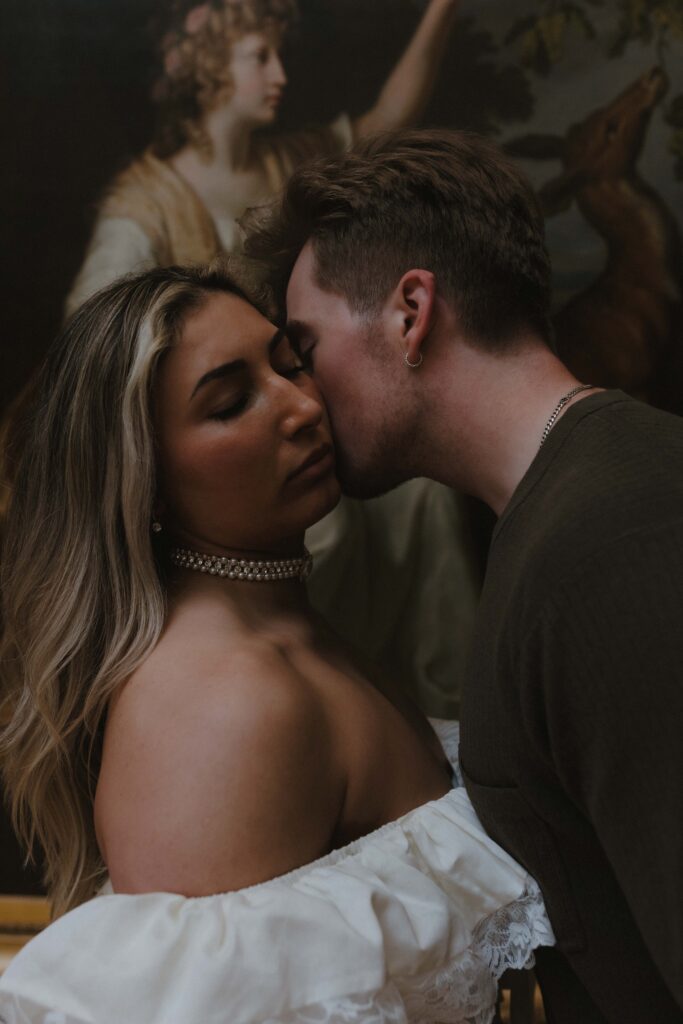 Luxury engagement photography at the National Portrait Gallery Edinburgh by Aly Robinson featuring intimate close-up of couple in soft light